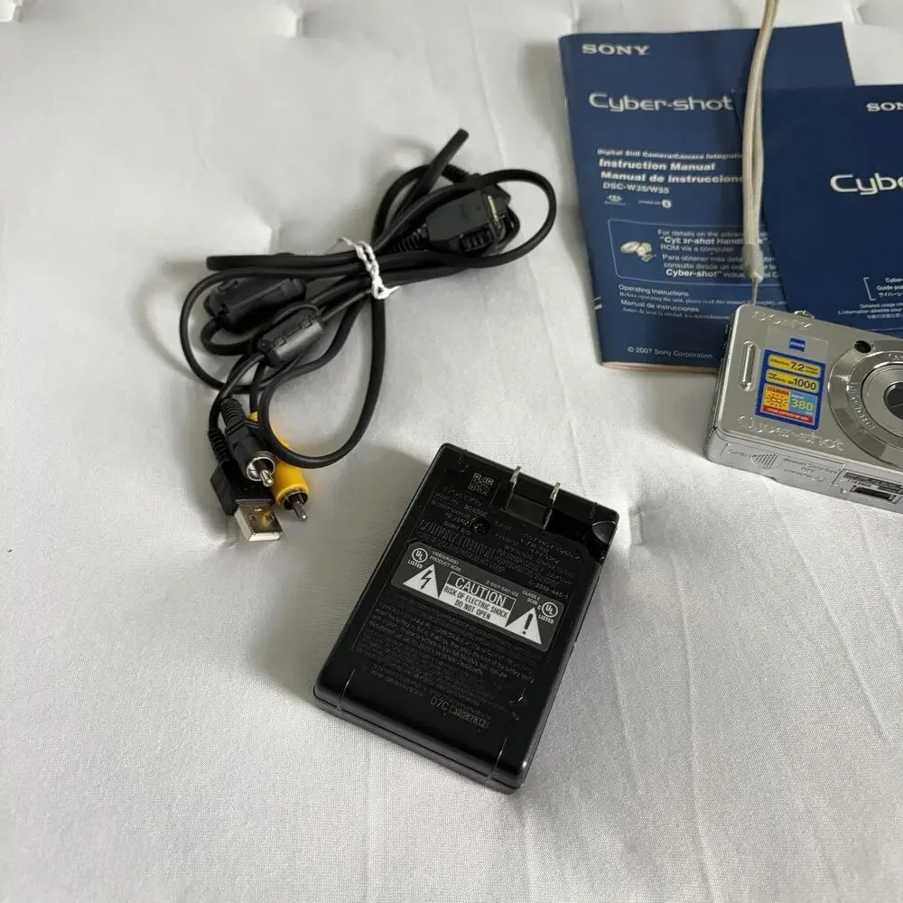 Sony Cyber-shot DSC-W55 7.2MP Digital Camera Silver, MpegmoveVX, 3X optical zoom